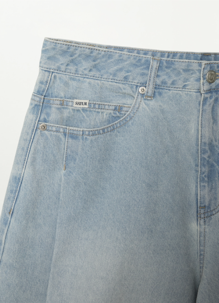 (U) Pleated Wide Curved Washed Denim Shorts