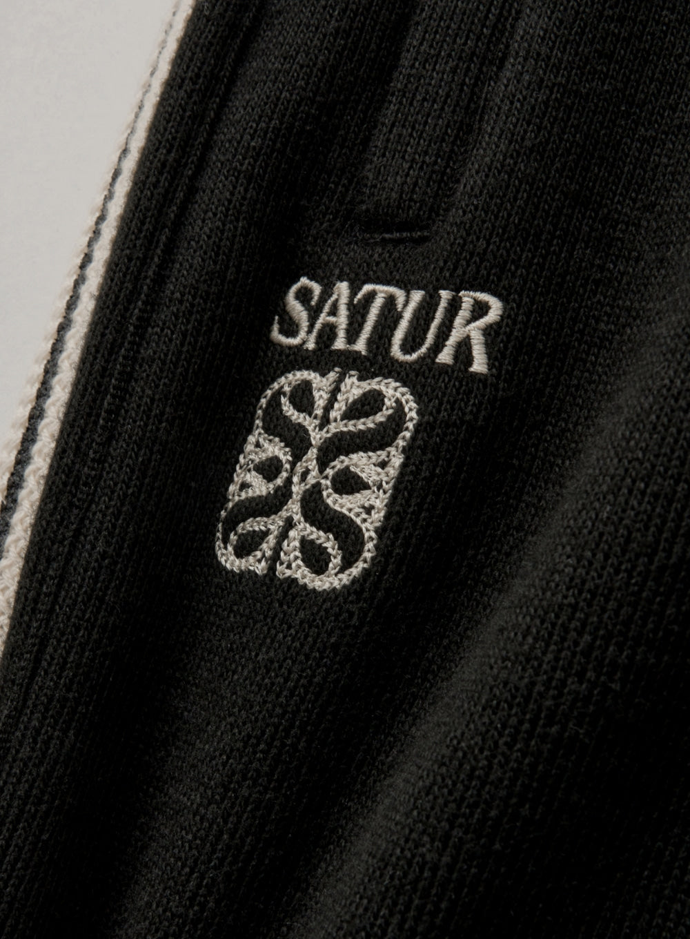 (U) Satur X Lacoste Lawton Track Pants