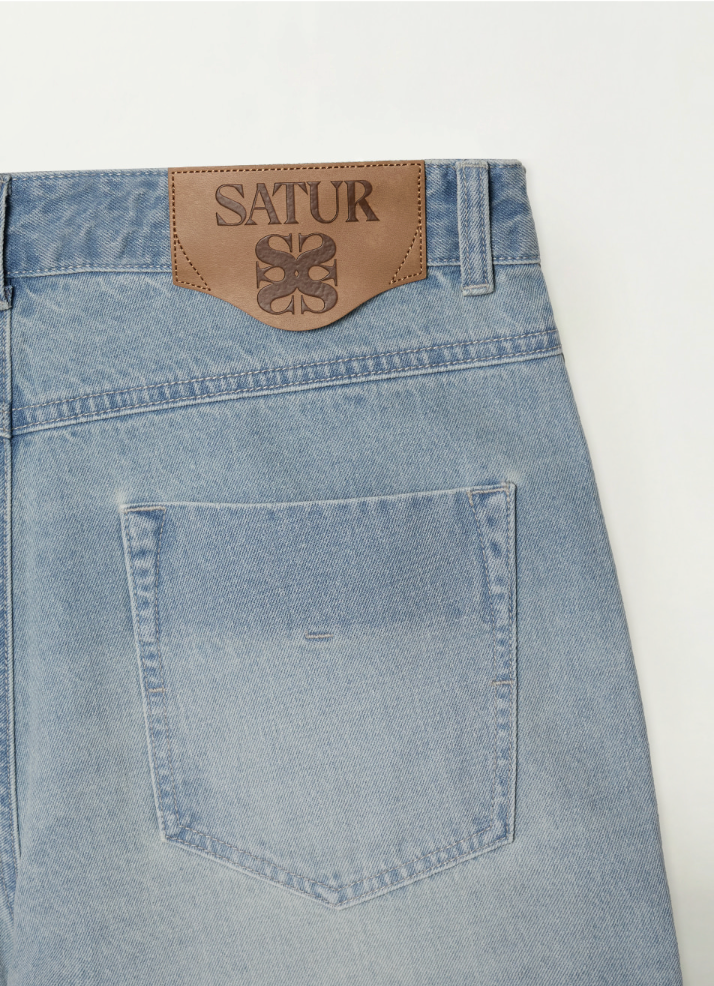 (U) Pleated Wide Curved Washed Denim Shorts